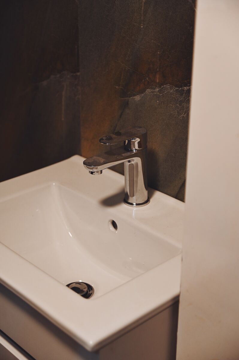 New bathroom vanity unit and tap fitted during a Glenrothes renovation