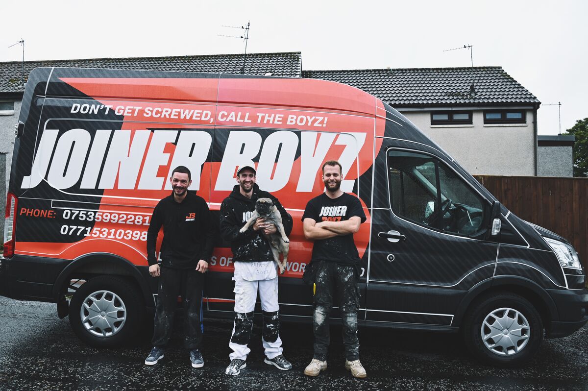 The Joiner Boyz team with their van on a renovation job in Glenrothes, Fife